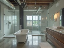 A Large, Modern Bathroom With A White Bathtub And A Glass Shower Stall. The Bathroom Is Spacious And Well-lit, With A View Of The Outside. Scene Is Clean, Elegant, And Inviting