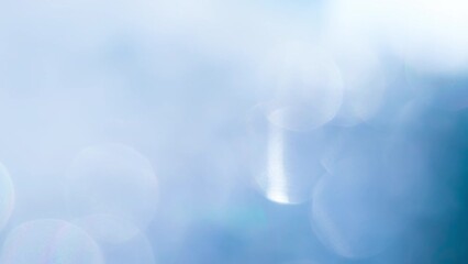 Wall Mural - Swirling Bokeh in Sky Tones. Loop. A large number of sparkling faceted crystals shimmer and create romantic bokeh