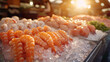 Fresh shrimp and salmon on ice at market.