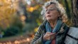 © ORG - Elderly woman, heart attack and pain in park, heart risk or high blood pressure in nature