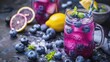 A vibrant blueberry lemonade, with plump blueberries and tart lemon juice, served over ice in a mason jar with a sprig of fresh mint for garnish, perfect for a summer picnic.