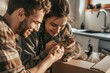 A young couple shares a tender moment with a new kitten sitting inside a cardboard box, suggesting themes of moving or pet adoption