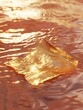gold metal plate foil floating on red water ocean ripple minimal poster art of gold object piece on red color water background