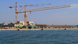 Two Cranes at Seawall Construction Site Floods Protection in Venetian Lagoon