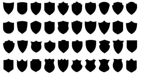 Wall Mural - shield icons set. black shields of different shapes in flat graphic design. vector illustration