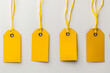 clean and modern photo a selection of yellow price tags against a pristine white background, offering a minimalist template for creating impactful product labels and promotional ma