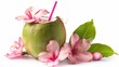 A green coconut with straw adorned by plumeria flowers. tropical coconuts drink in summer vacation.