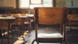 Close-up view of a wooden chair in a desolate classroom, emphasizing the quiet and the spirit of a new school year