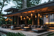 A modern outdoor living room with unique hanging lighting fixtures, perfect for relaxing and entertaining.