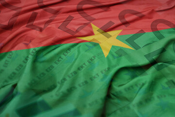 waving colorful national flag of burkina faso on a euro money banknotes background. finance concept.