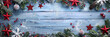 Christmas background with snow, pine branches and red stars on wooden board background. Christmas concept with copy space for text. Winter holiday decoration backdrop.banner