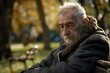 © dobok - portrait of sad old man sitting on a bench in a park