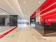 © MaxK - A large lobby with a red wall and white floor. The floor is tiled and the walls are made of glass. There are several chairs and a couch in the room