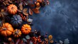 Thanksgiving and autumn decoration concept featuring autumn leaves and pumpkins on a dark background. Flat lay composition with a top view and copy space.