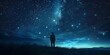 Silhouetted figure stands in awe inspiring starry night sky mountains in the distance cosmic wonders and celestial mysteries abound