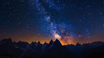 Wall Mural - night sky: a photo of the night sky over a mountain range, with the silhouette of the peaks