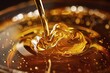 Indulge in the golden luxury of liquid honey, its viscous flow inviting you to savor the essence of pure indulgence