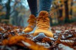 © Larisa AI - A pair of bold yellow sports shoes stand out amidst a blanket of fallen autumn leaves, symbolizing active lifestyle