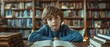 A young boy in a blue sweater sits at a wooden table in a library, completely absorbed in a book The shelves around him are filled with books of all shapes and sizes, creating a serene and studious at