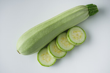 Wall Mural - fresh natural zucchini on a white background