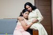 Indian mother supporting her teen daughter in her Problem and health issue,Supporting mother for her teenage daughter