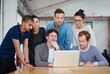 © peopleimages.com - Training, employee and office with laptop for teamwork, collaboration and internship with mentor. Support, help and learning with technology for career growth, progress and review as web designer