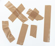 Ripped brown plastic tape pieces