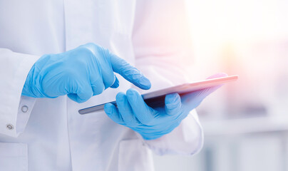 Concept food industry banner on white background. Factory worker inspecting production with computer tablet