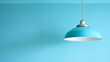   A blue ceiling lamp suspends above a room with blue walls, while a separate blue ceiling light completes the space's cohesive color scheme