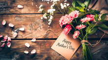 A Beautiful Bouquet Of Flowers Placed On A Wooden Table And Next To It There Is A Cardboard Label. Perfect For Mother's Day. Gift, Giving, Wood, Love, Plants, Flowers, Spring, Summer.