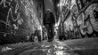 Noir-Inspired Monochrome Image of a Solitary Figure Walking Down a Graffiti-Laden Alleyway
