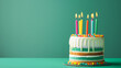 © Anthichada - Birthday cake with colorful candles, on green background
