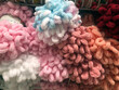 Large selection of colored threads for embroidery floss and cross stitch. Large set of colored threads for needlework.