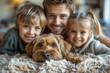 Father and two kids smile with a small dog in a cozy home setting