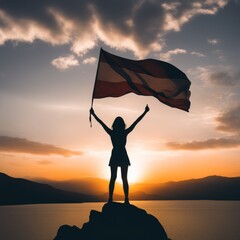 Wall Mural - female hands holding the flag of thailand on top mountain. concept victory day, independence day and national freedom.