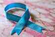 National Foster Care Month awareness concept with symbolic blue ribbon and heart, promoting foster family support and child welfare services 