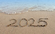 New Year 2025 is coming concept on tropical beach.