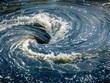 © Jan - A dynamic whirlpool spirals with forceful water currents.