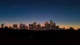 Fototapeta Miasto - Aerial panorama view of Atlanta's night skyline shot during sunset from Piedmont Park in USA