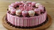   A cake adorned with pink frosting, chocolate sprinkles, and the digit 50 as its topper