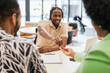 © ADDICTIVE STOCK - Handing over keys in a modern coworking office space