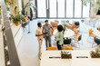 © ADDICTIVE STOCK - Modern coworking space with diverse team interacting