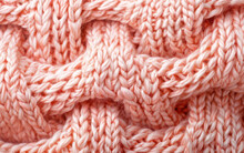 Macro Shot Of Cozy Pastel Pink Knitted Blanket Texture