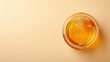 © Belho Med - pure honey top view in clear jar for culinary design and natural product promotion, with copy space for text