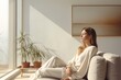 © Rawpixel.com - Woman sitting in her home