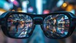 City street reflected in pair of eyeglasses with blurred background