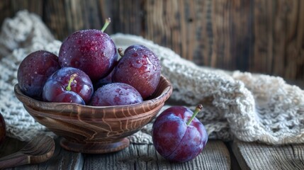 Poster - Plums in a bowl on wooden table