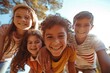 © Chacmool - Close up portrait of a group of children looking at camera and smiling