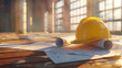 Yellow Hard Hat and Blueprints on Table at Construction Site..