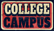 Aged and worn college campus sign on wood